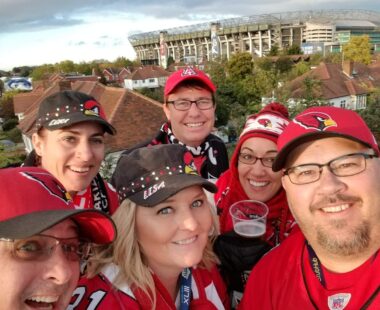 group of Birdgang members selfie outside stadium